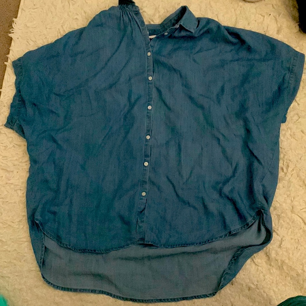 This is a lovely soft button down jean blue shirt made from lyocell